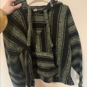 Green and black drug rug